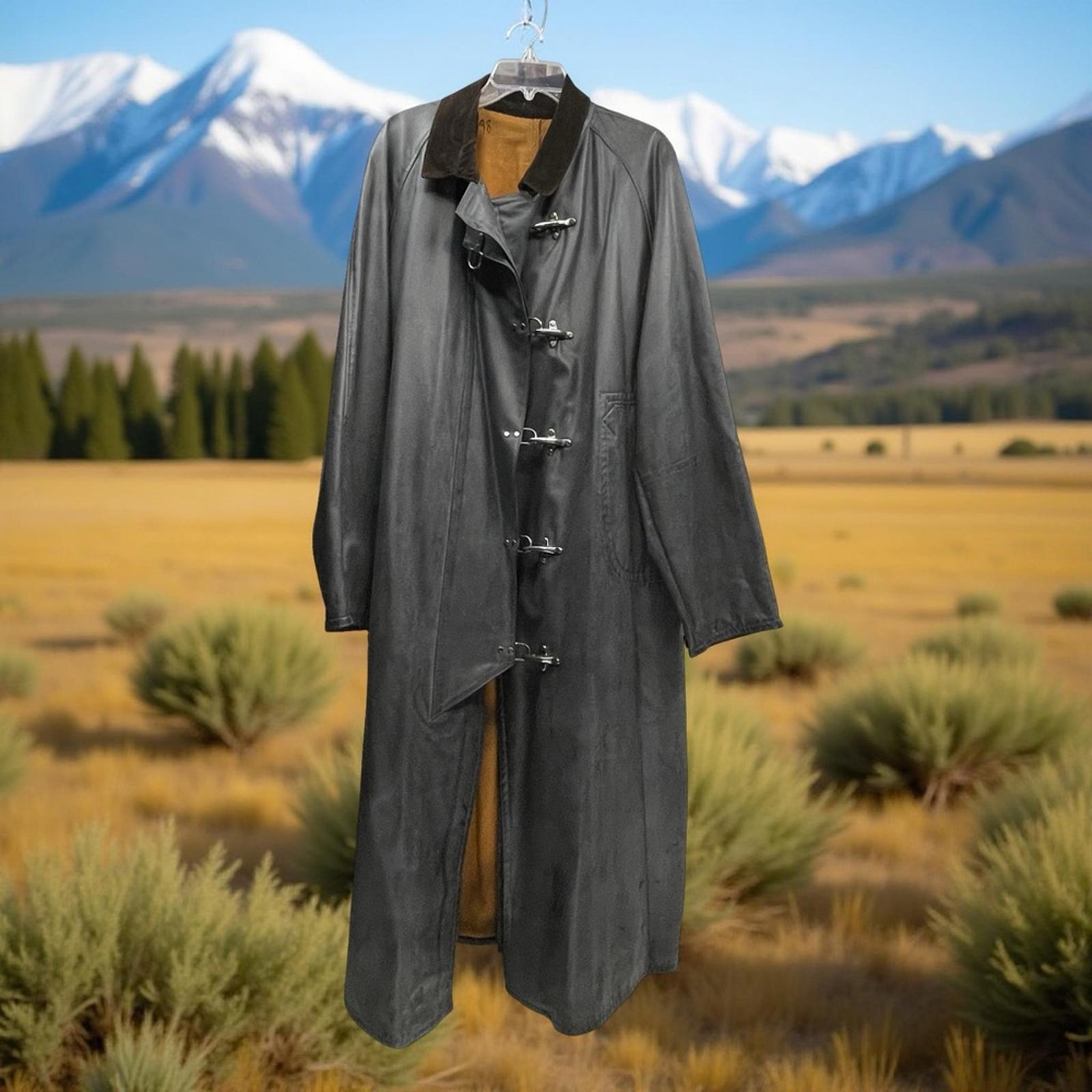 Gray Country Cowboy coat on a hanger with a mountainous landscape in the background